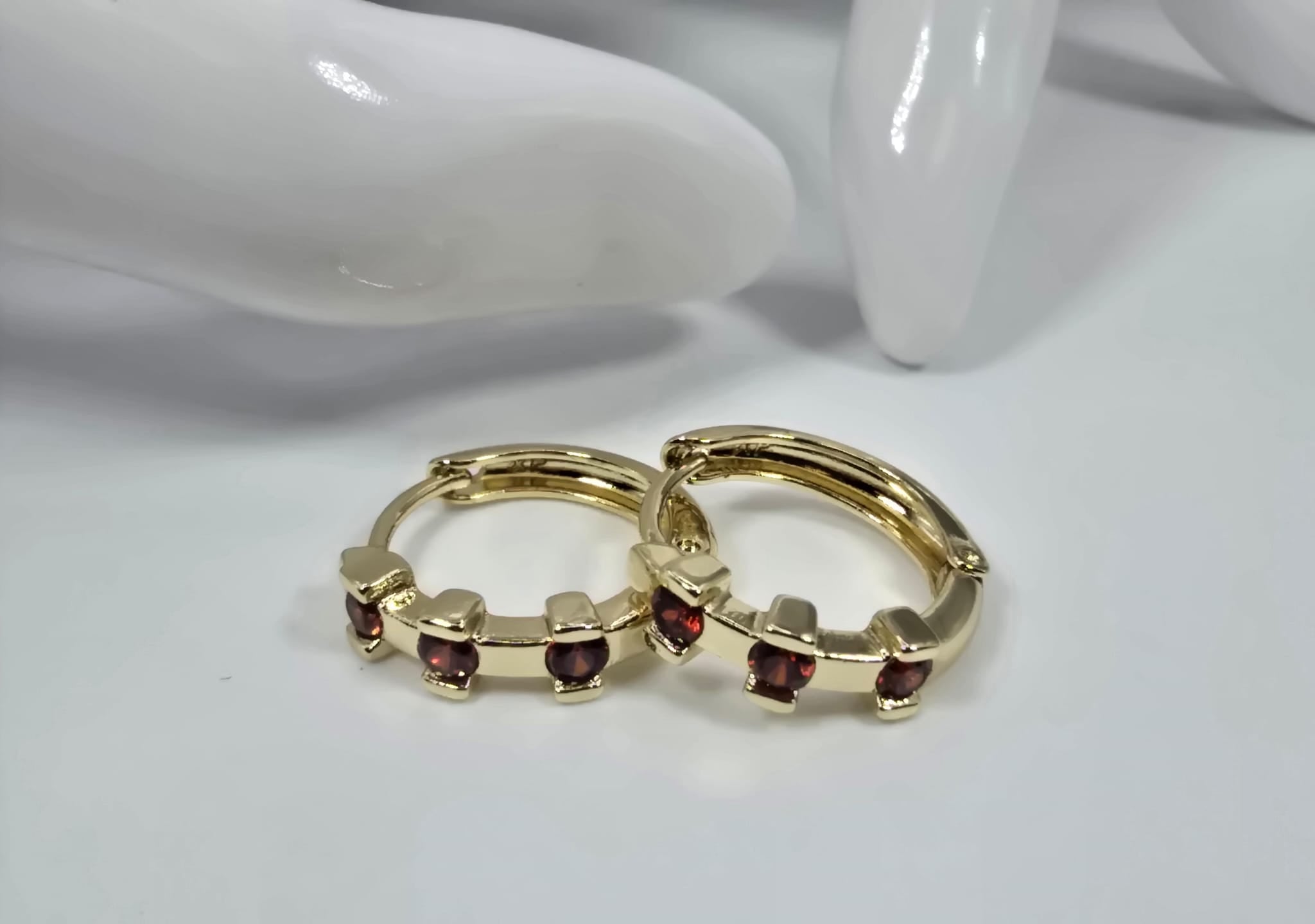 Gold Earing Lined w/ 3 gems