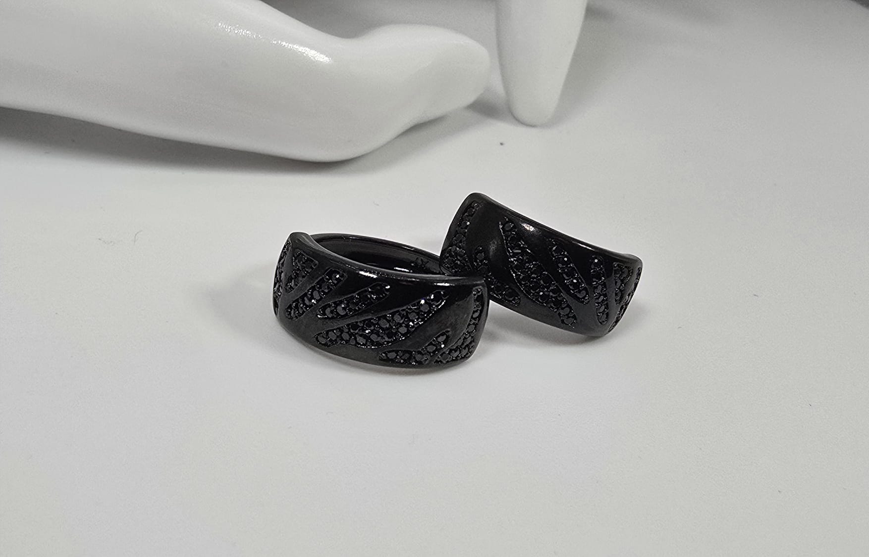 Black design earrings